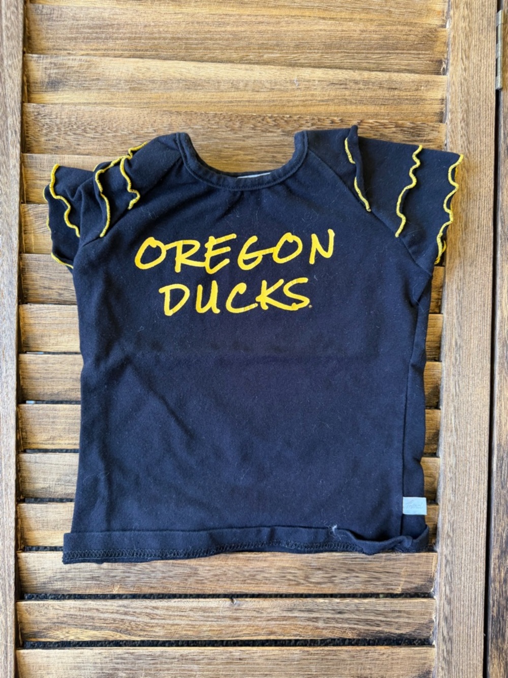 Girls Black Oregon Ducks Short-Sleeve Tee with Yellow Ruffle Trim Size 2T